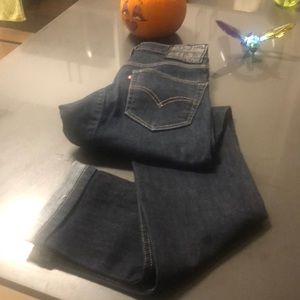 Black button levi jeans.